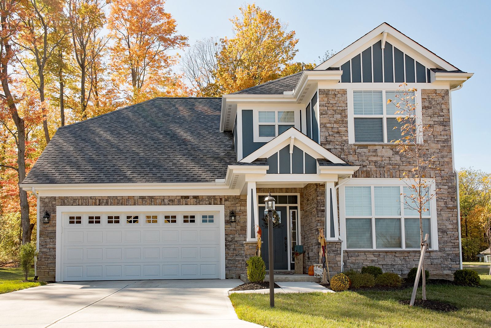 Beautiful-Luxury-Gray-Flagstone-Home-with-Garage-in-Fall